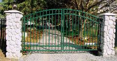 Double Drive Powder coated Iron Gate and River Stone Columns